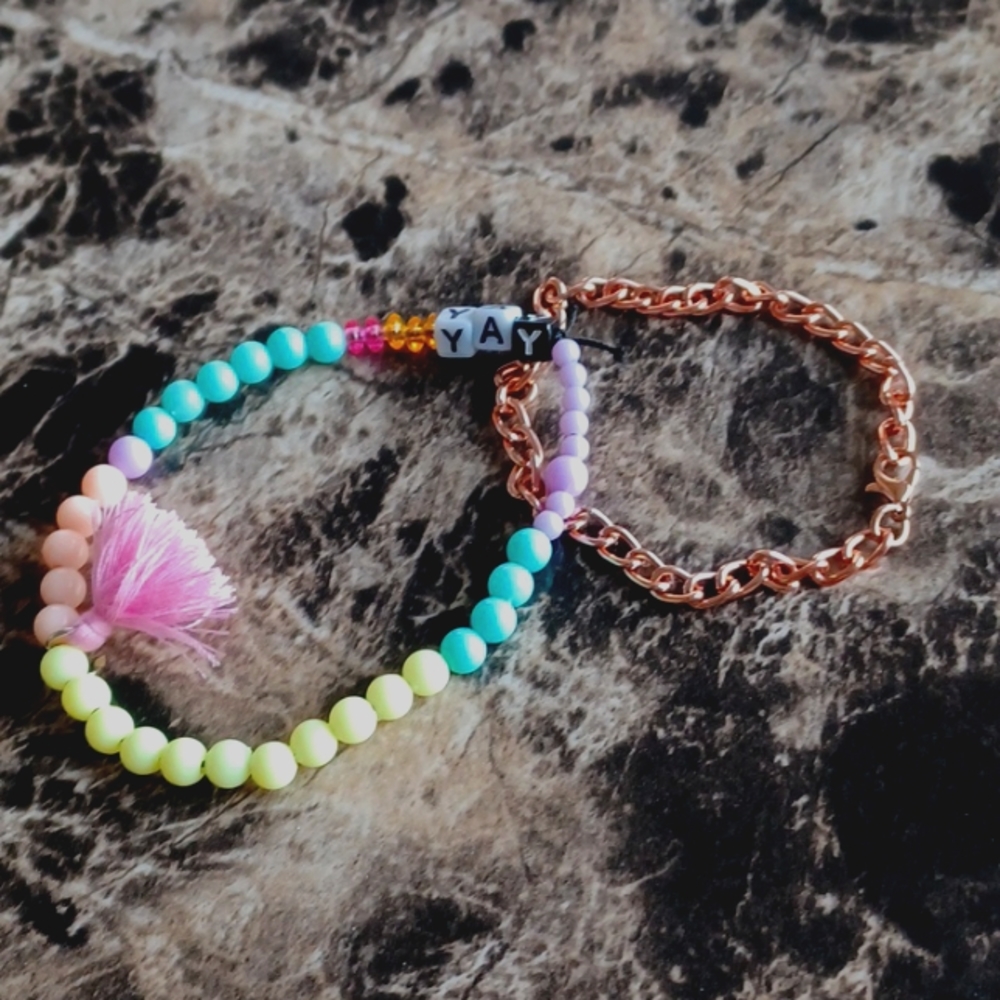 Ankel bracelets the big one is for a big kid the small gold one is for a baby.